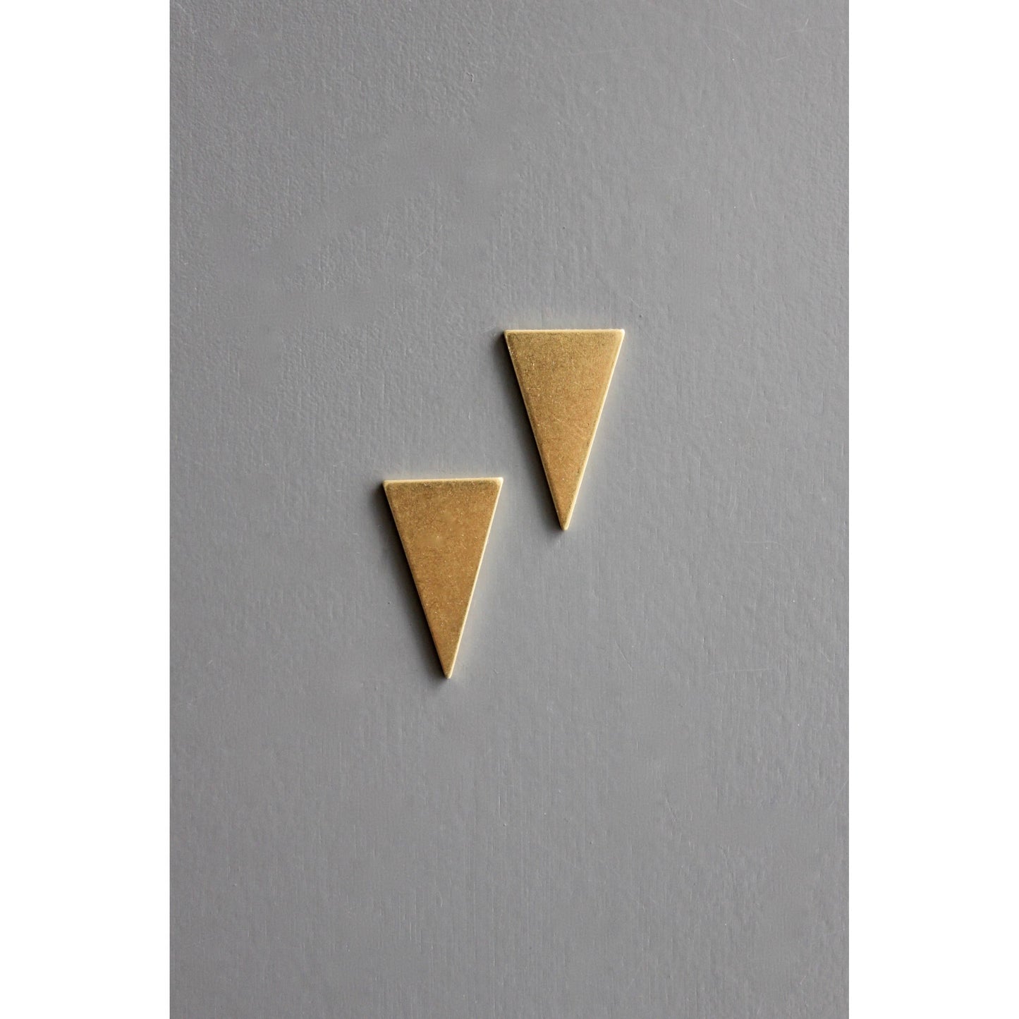 Brass Triangles